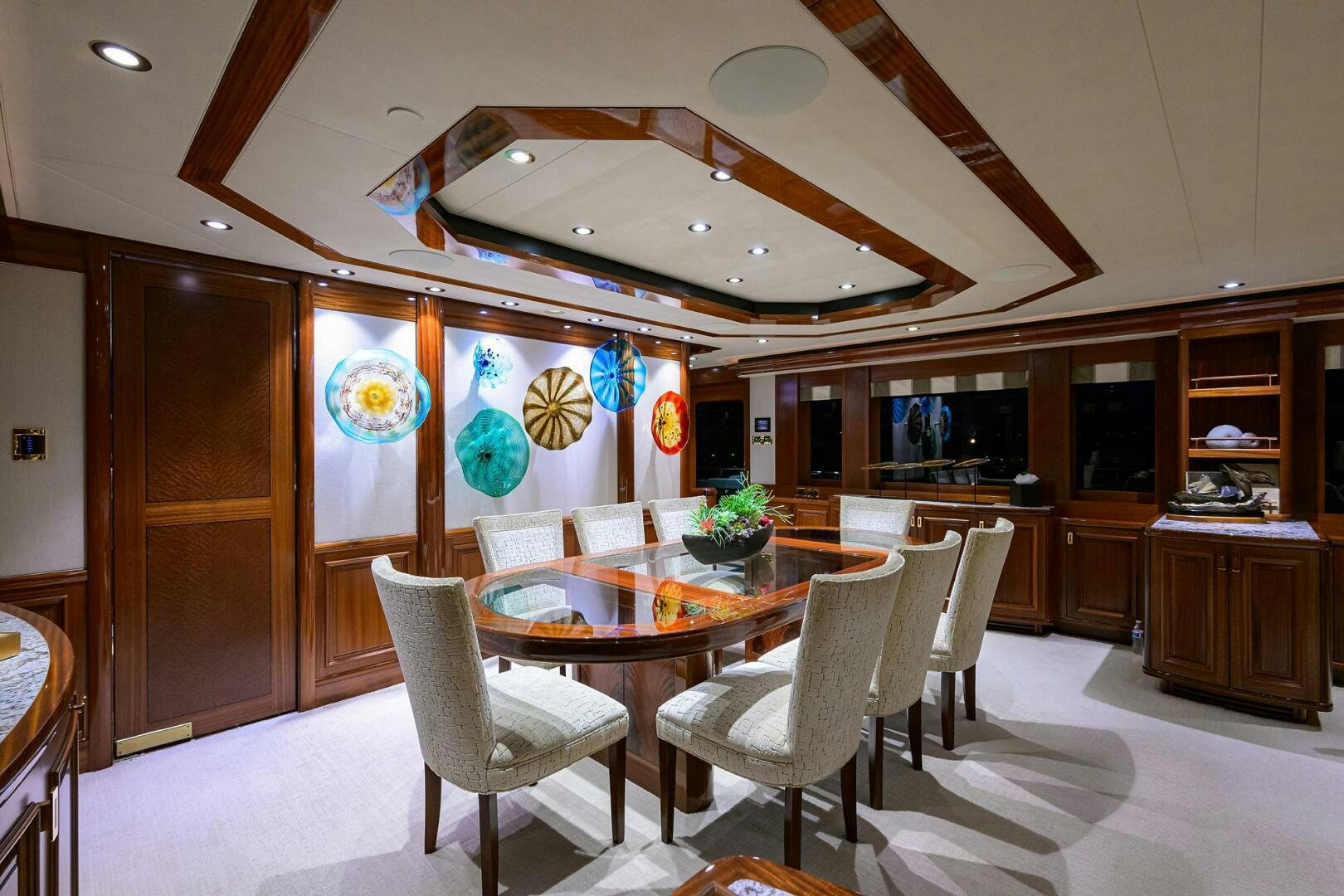a dining room with a table and chairs aboard SARABETH Yacht for Sale