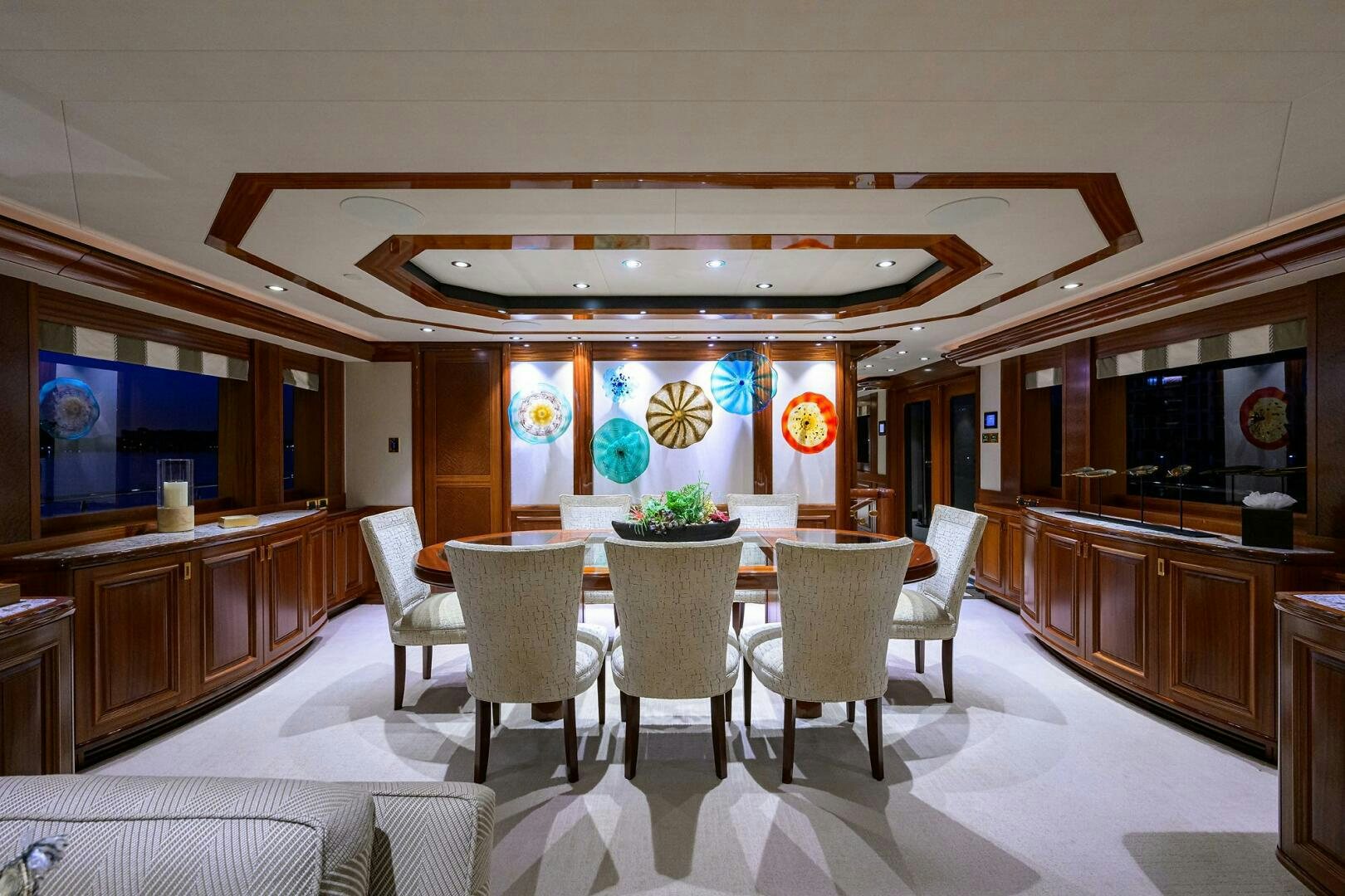 a dining room with a table aboard SARABETH Yacht for Sale
