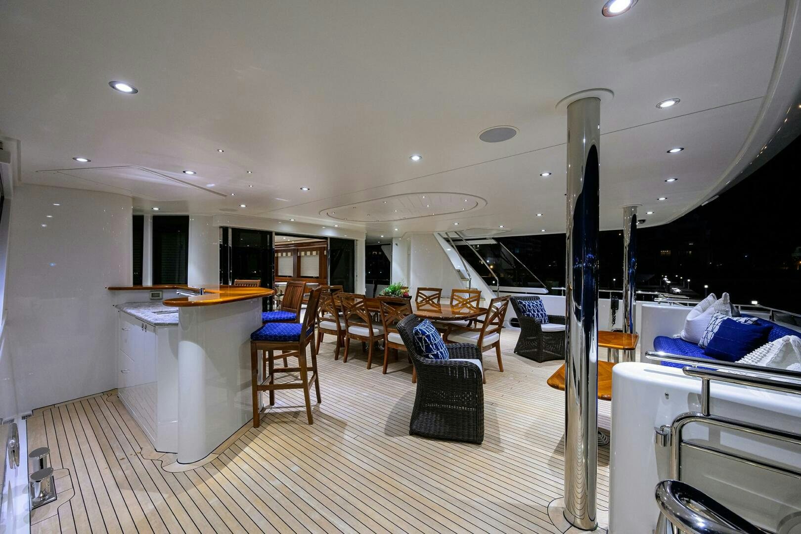 a room with a table and chairs aboard SARABETH Yacht for Sale