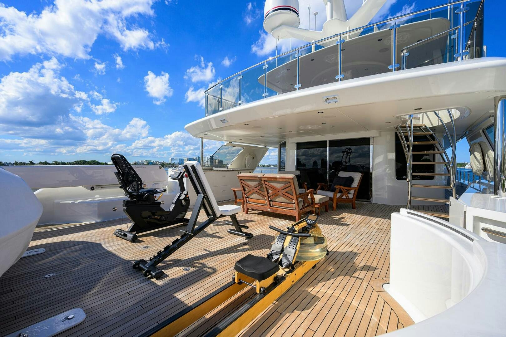 a deck with a deck and chairs on it aboard SARABETH Yacht for Sale