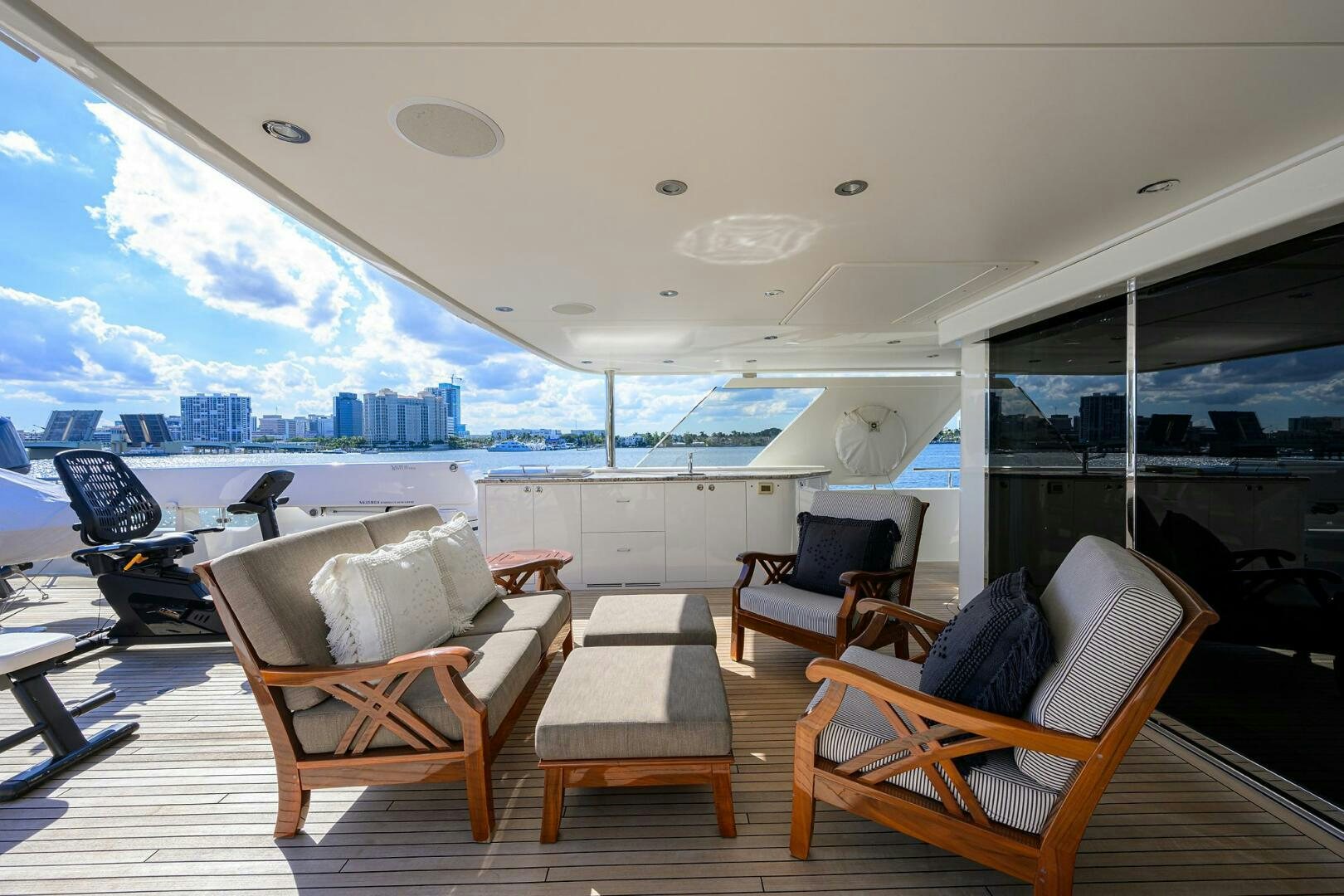 a room with chairs and a table aboard SARABETH Yacht for Sale