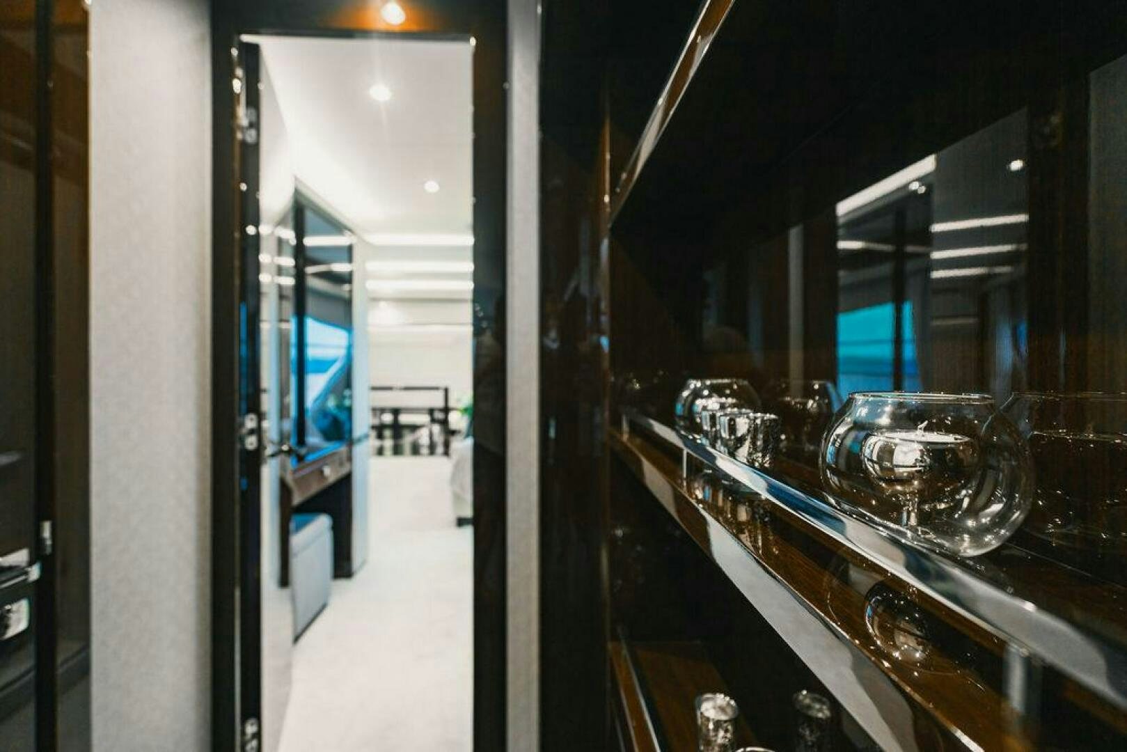 a glass on a table aboard PURA VIDA Yacht for Sale