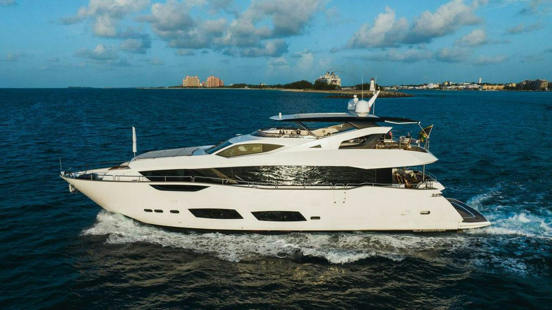 a white yacht on the water aboard PURA VIDA Yacht for Sale