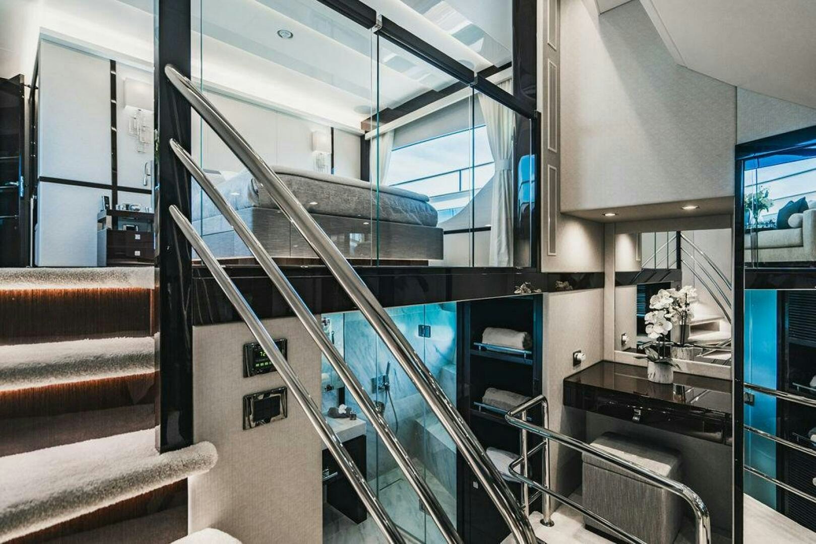 a room with glass doors aboard PURA VIDA Yacht for Sale