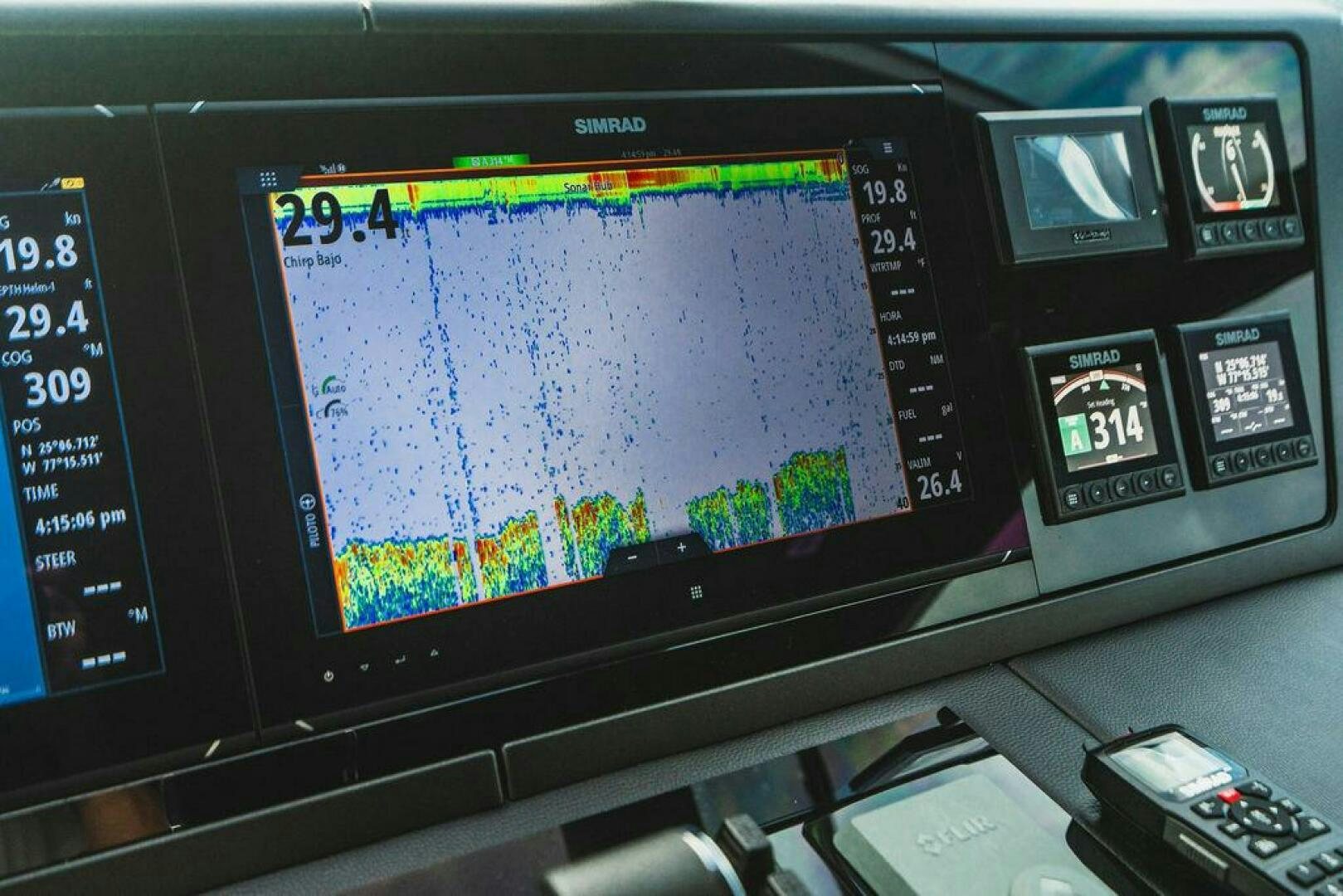 a computer monitor with a blue screen aboard PURA VIDA Yacht for Sale