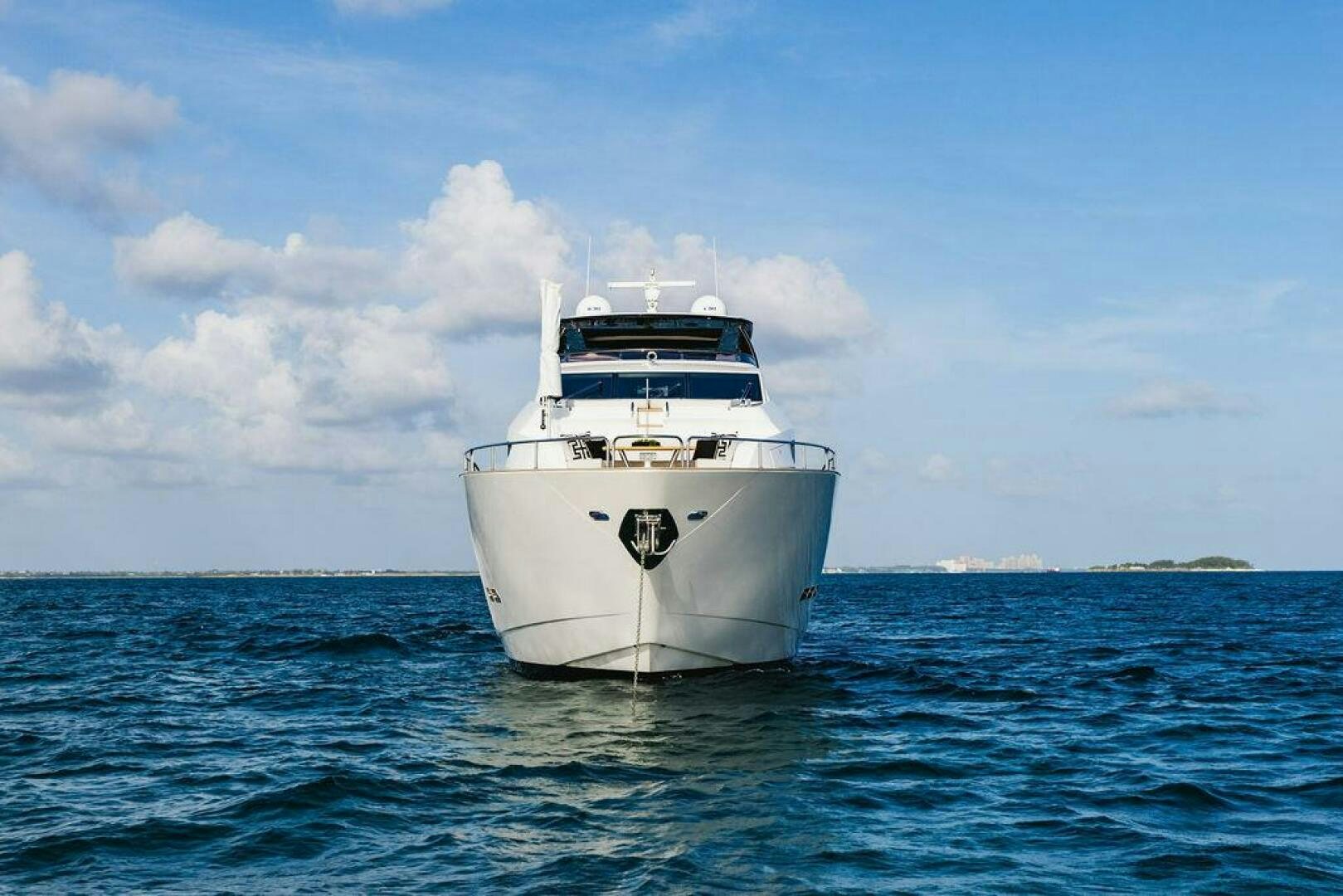 a white boat in the water aboard PURA VIDA Yacht for Sale