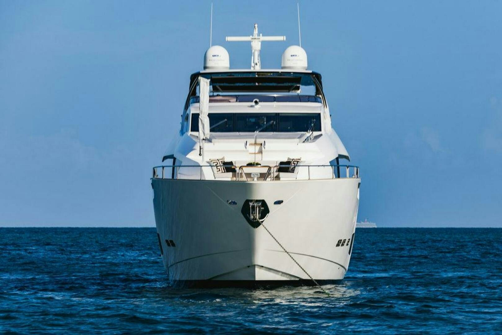 a large white boat in the water aboard PURA VIDA Yacht for Sale