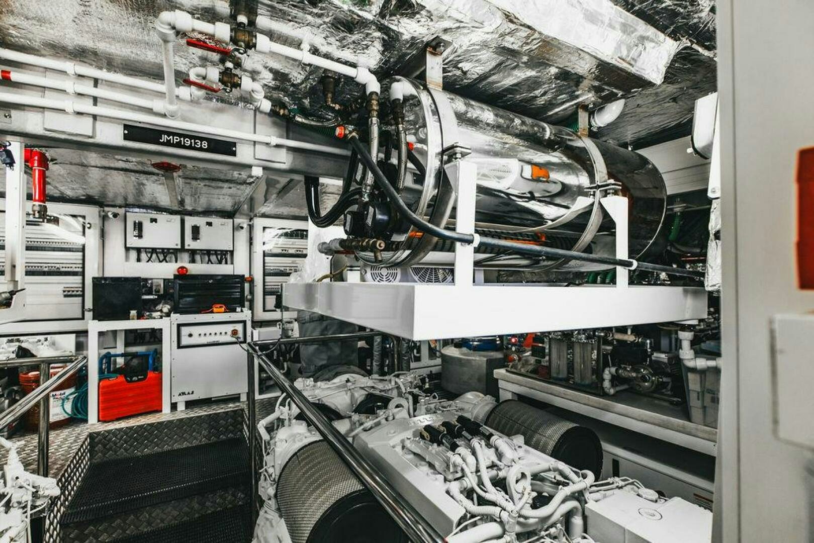 a large room with machinery aboard PURA VIDA Yacht for Sale
