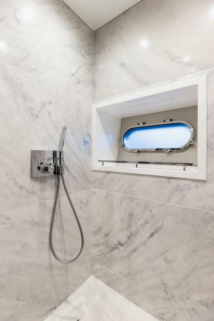 a wall with a light on it aboard PURA VIDA Yacht for Sale