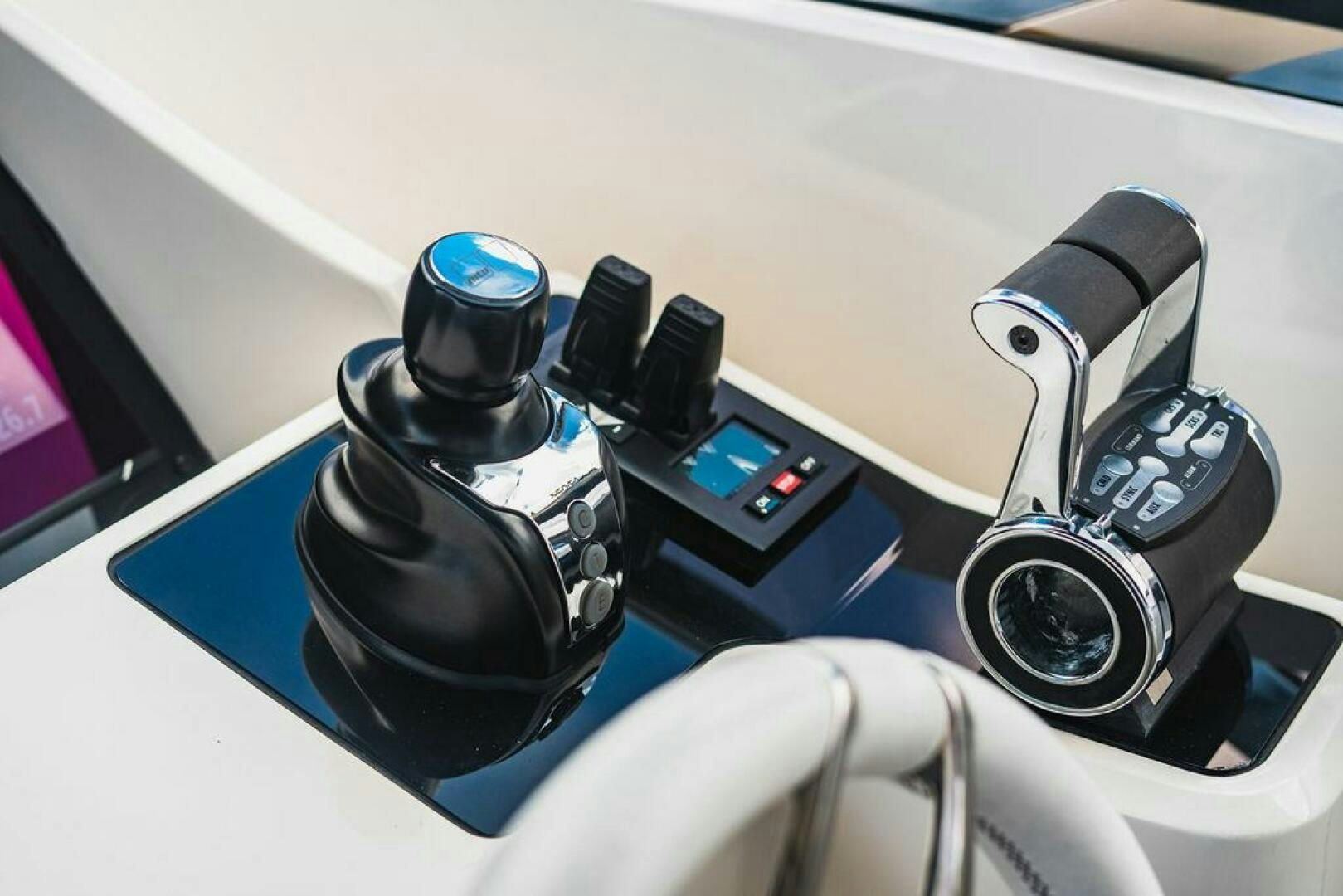 a close-up of a car stereo aboard PURA VIDA Yacht for Sale