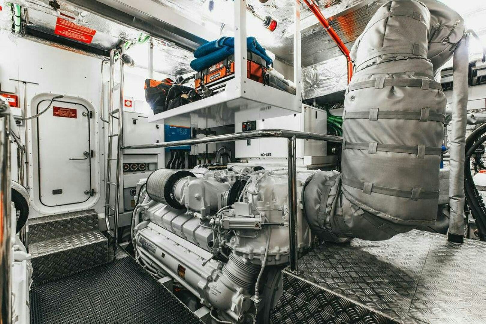 a machine with a large tire aboard PURA VIDA Yacht for Sale