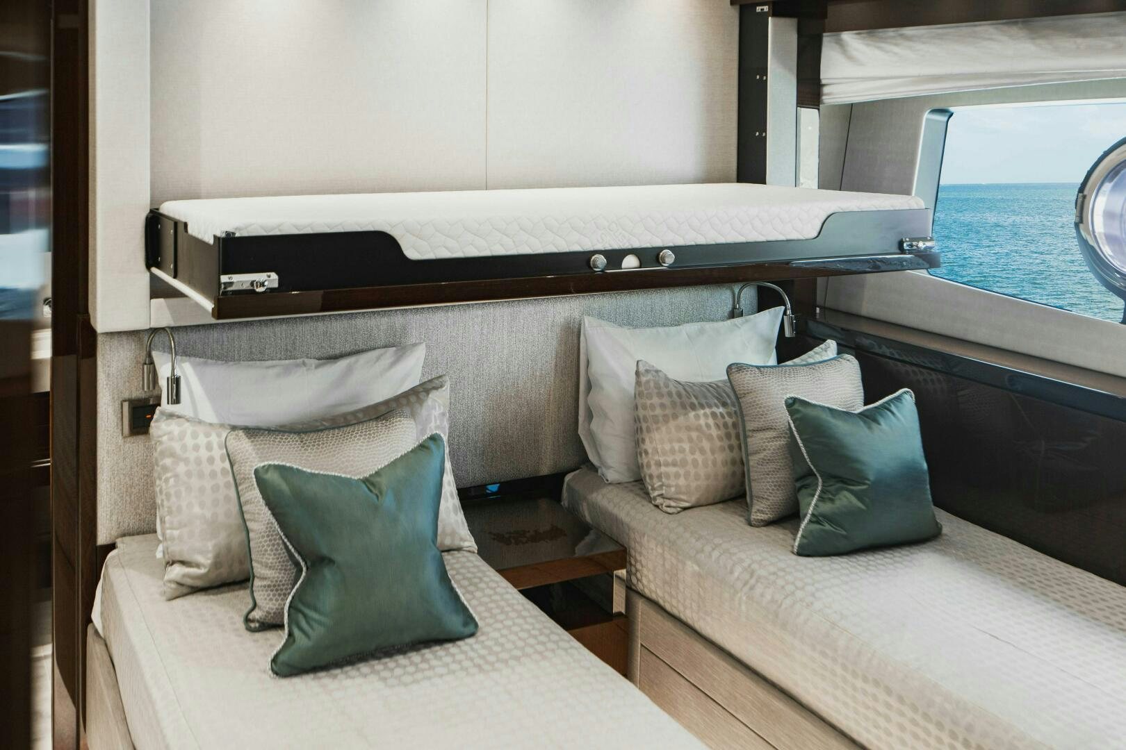 a bed with pillows and pillows aboard PURA VIDA Yacht for Sale