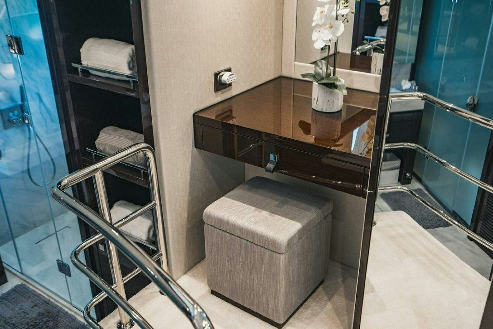 a bathroom with a sink and a mirror aboard PURA VIDA Yacht for Sale