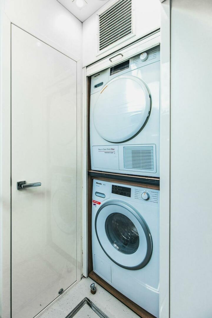 a white washing machine aboard PURA VIDA Yacht for Sale