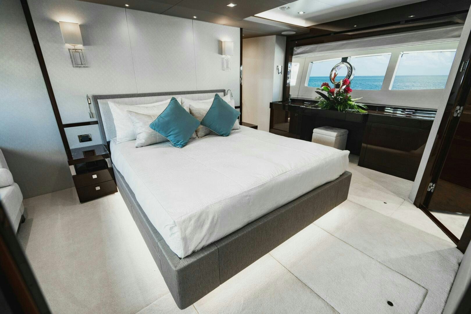 a bed in a room aboard PURA VIDA Yacht for Sale