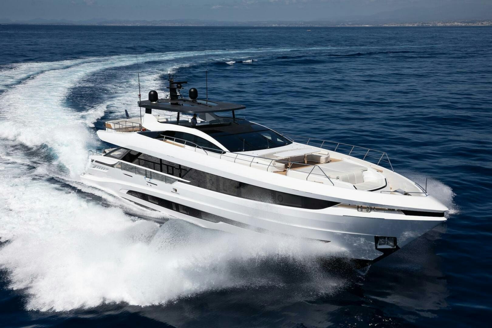 a white yacht on the water aboard ARTEMIS Yacht for Sale