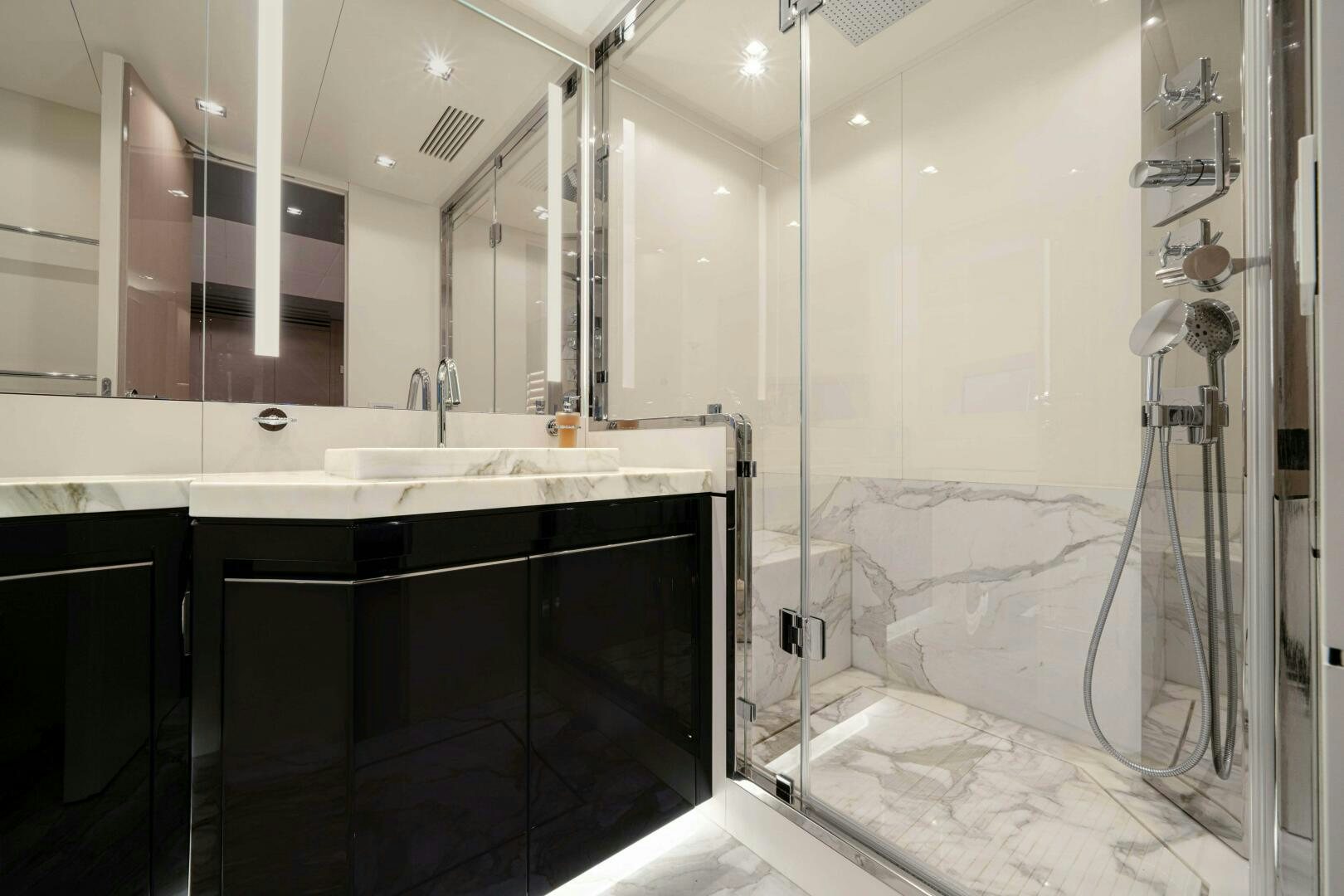 a bathroom with a shower and sink aboard ARTEMIS Yacht for Sale