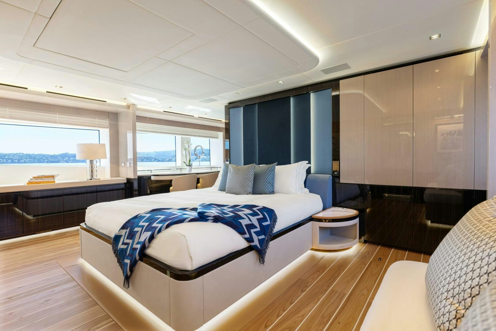 a room with a bed and a window aboard ARTEMIS Yacht for Sale