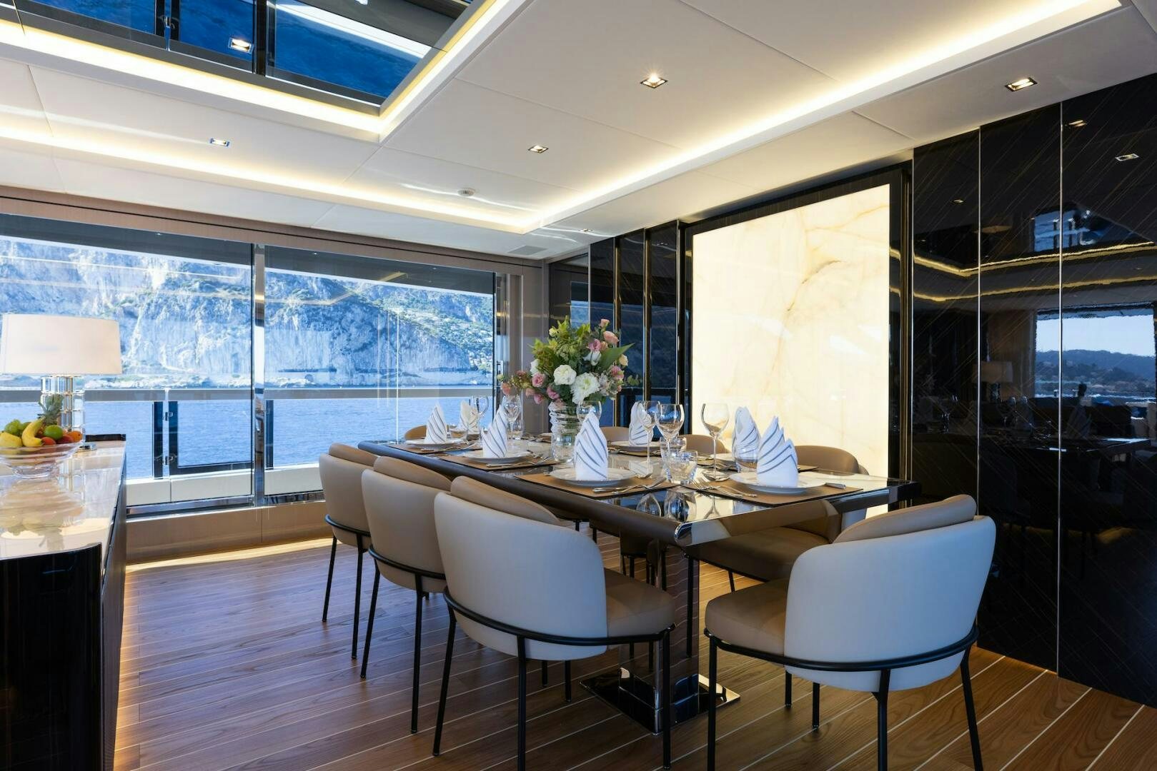 a dining room with a table and chairs aboard ARTEMIS Yacht for Sale