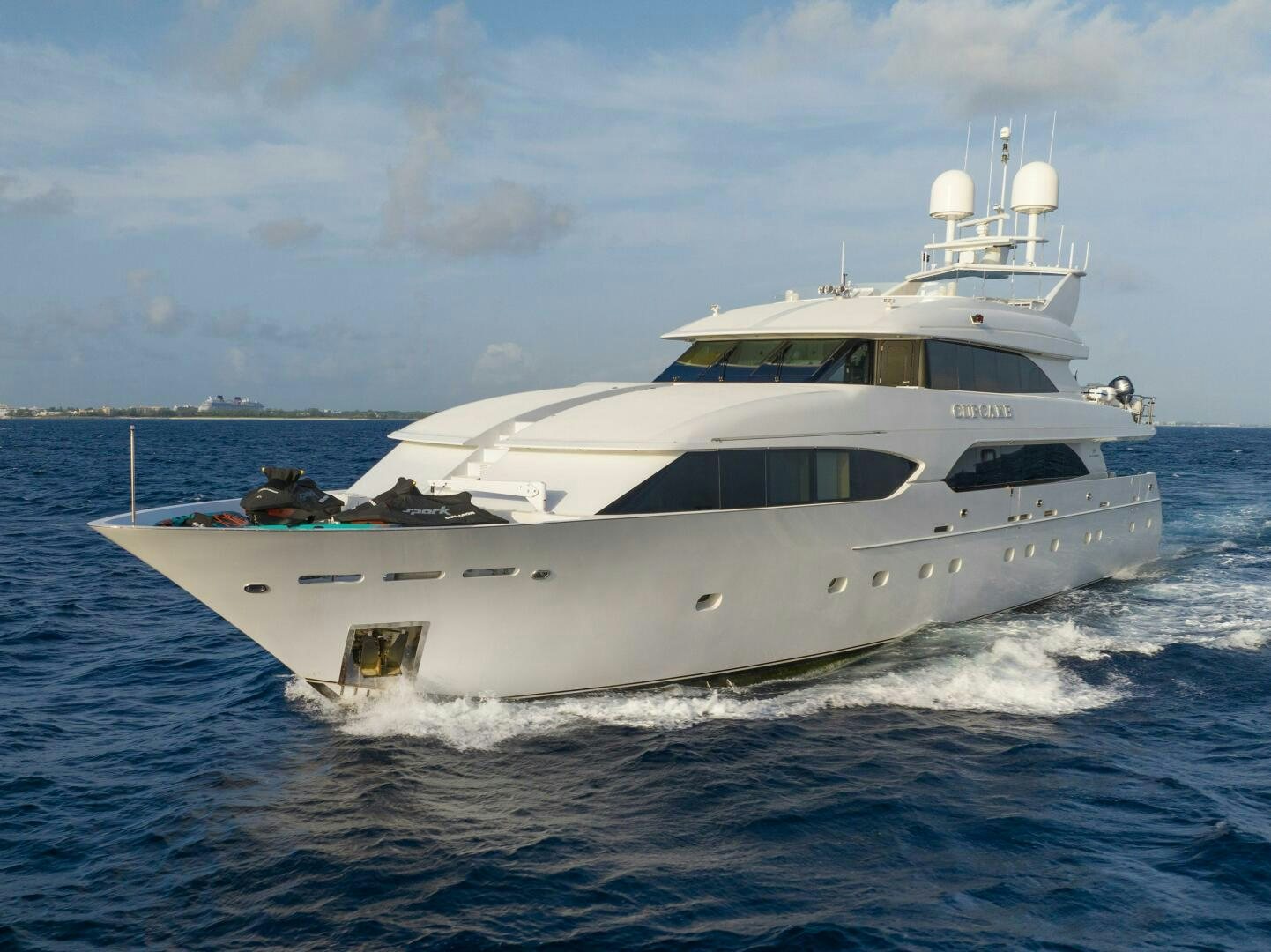 a white yacht on the water aboard CUPCAKE Yacht for Sale