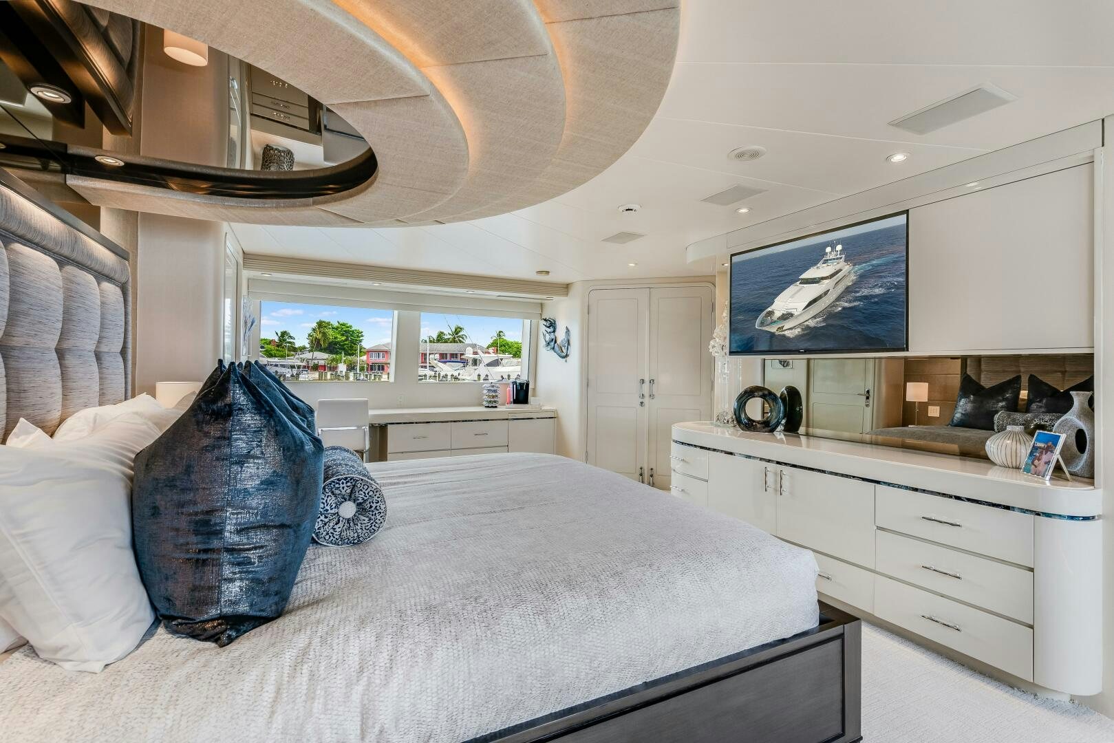 a bedroom with a large bed aboard CUPCAKE Yacht for Sale