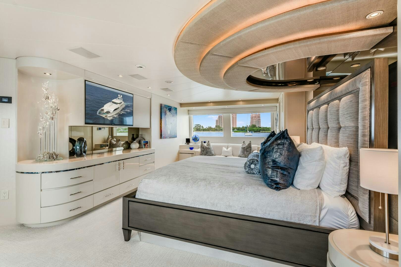 a bedroom with a large bed aboard CUPCAKE Yacht for Sale