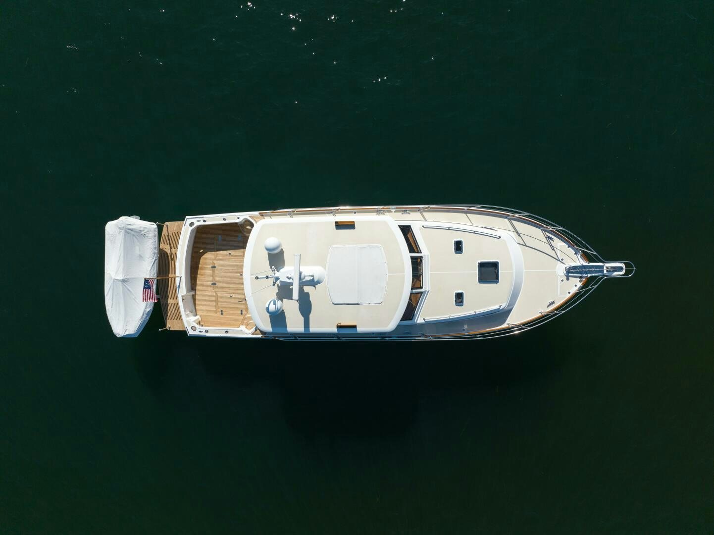 a white object on a green surface aboard FINALLY US Yacht for Sale