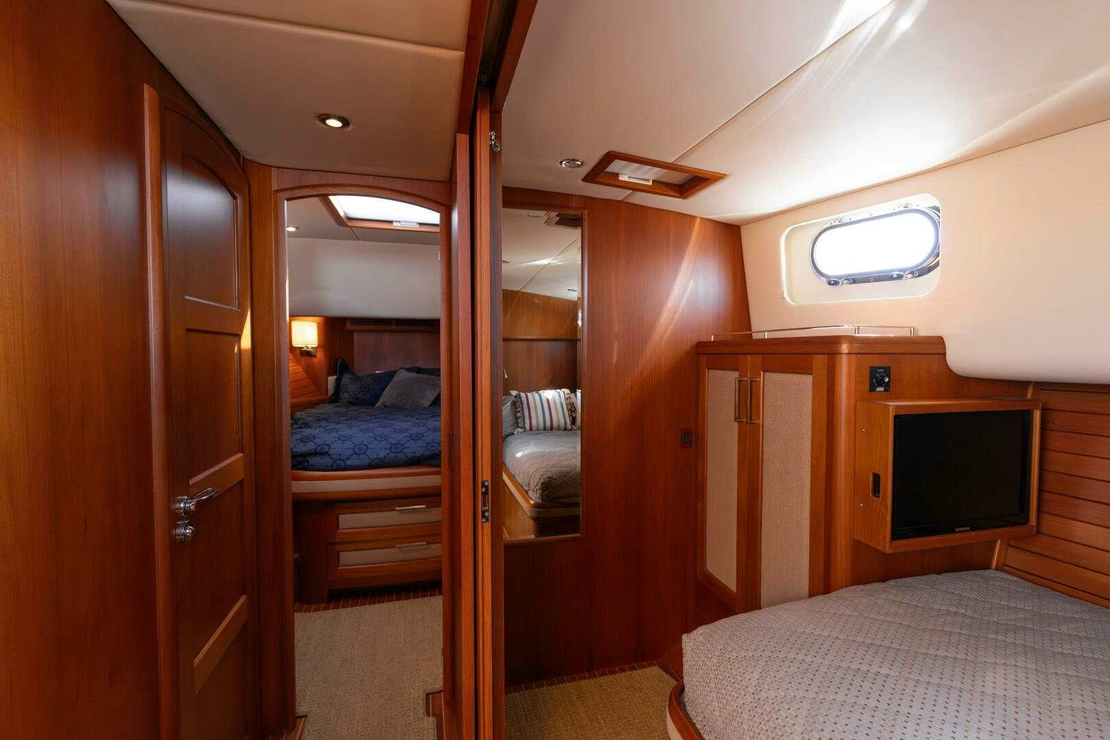 a bedroom with a bunk bed aboard FINALLY US Yacht for Sale