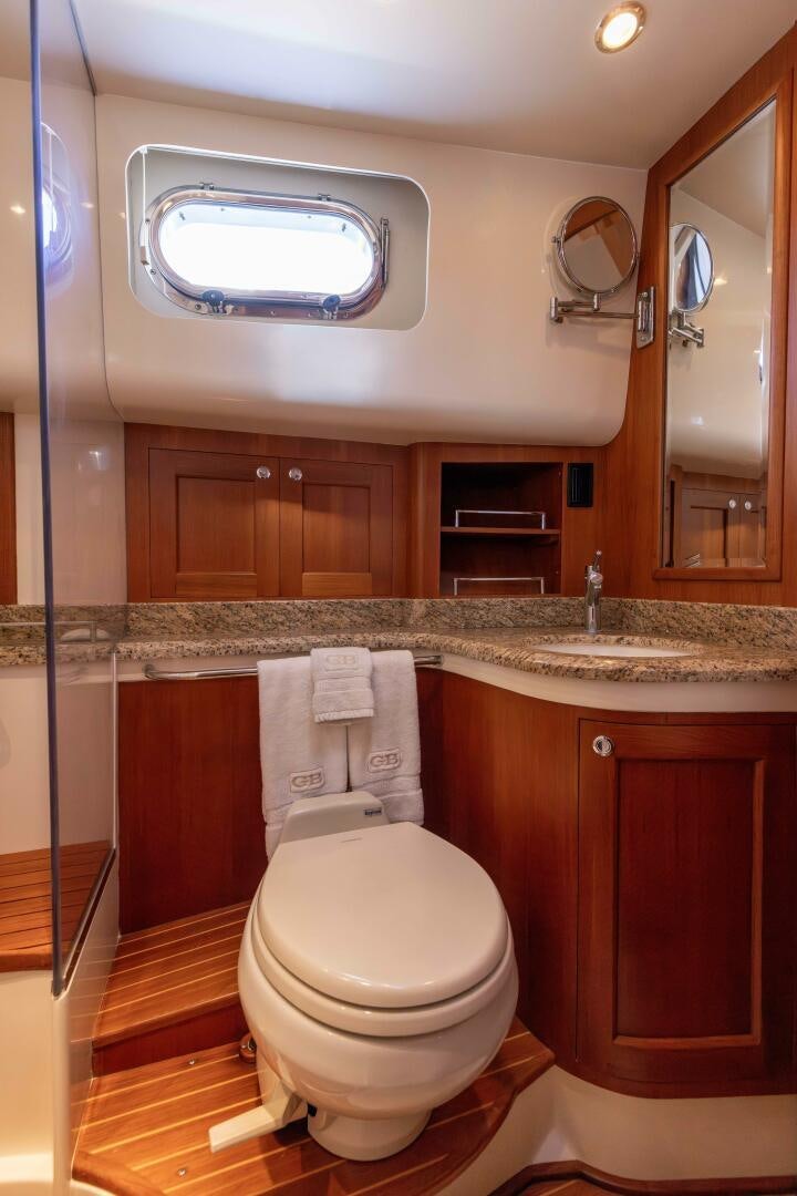 a bathroom with a marble counter top aboard FINALLY US Yacht for Sale