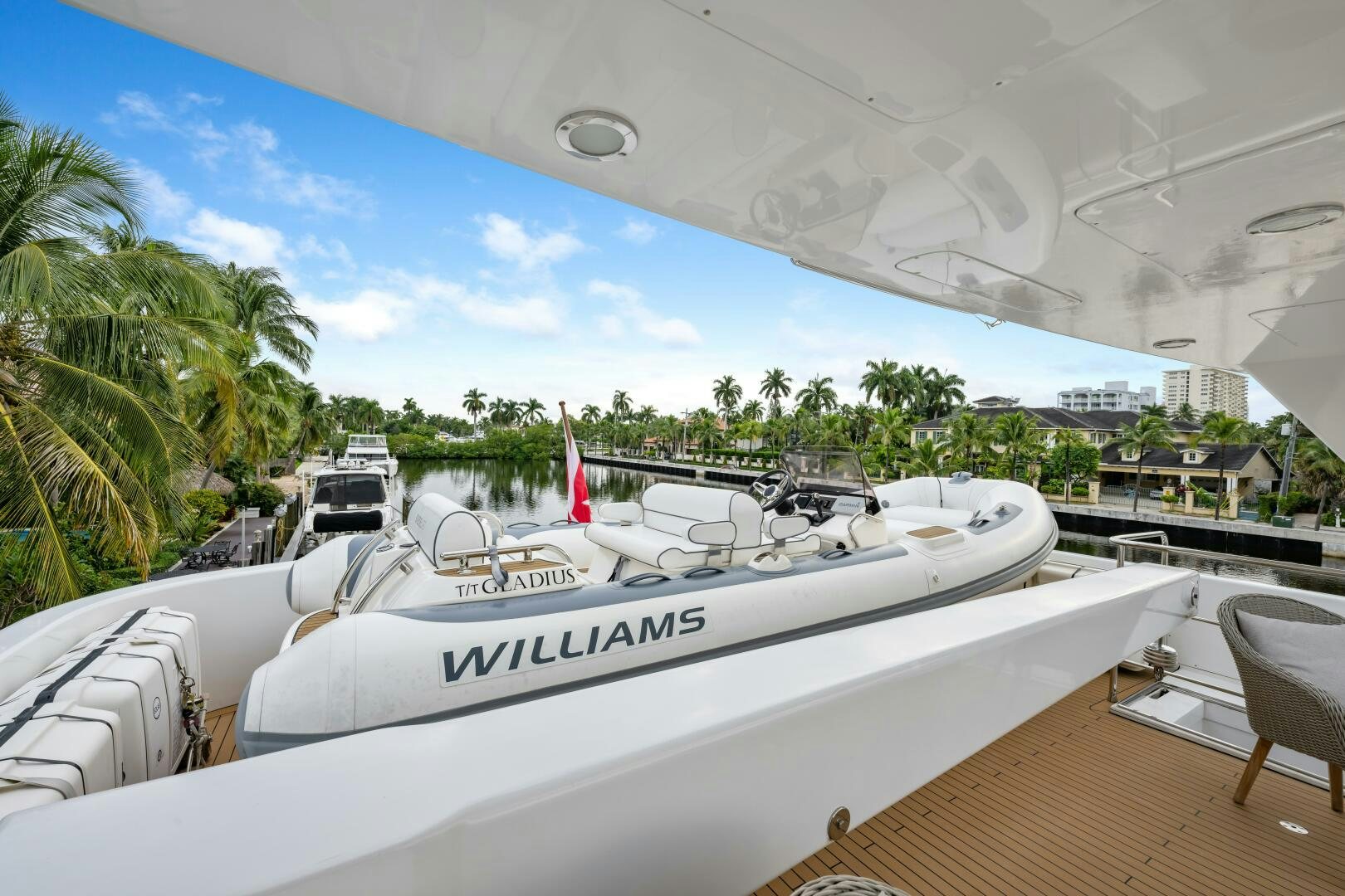 a white yacht on a deck aboard GLADIUS Yacht for Sale
