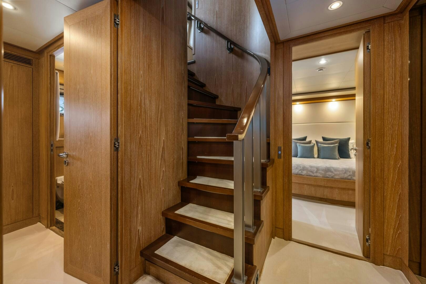 a wooden bunk bed in a room aboard GLADIUS Yacht for Sale