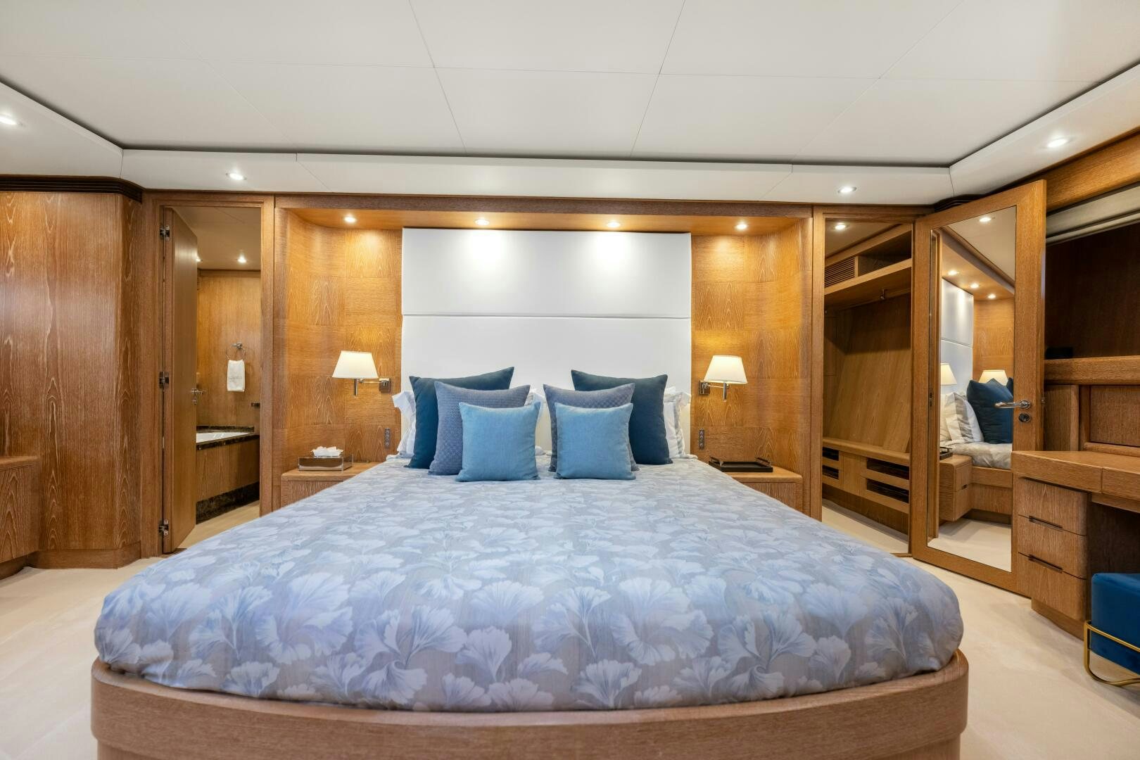 a large bed in a hotel room aboard GLADIUS Yacht for Sale