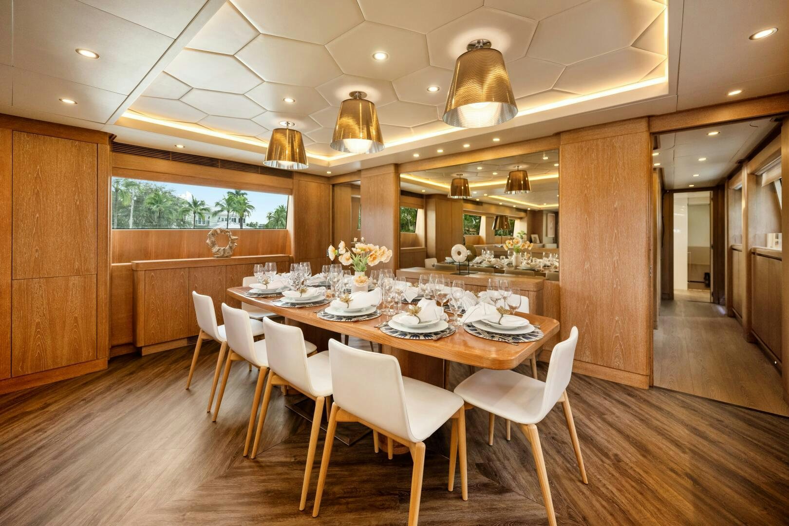 a large kitchen with a dining table aboard GLADIUS Yacht for Sale