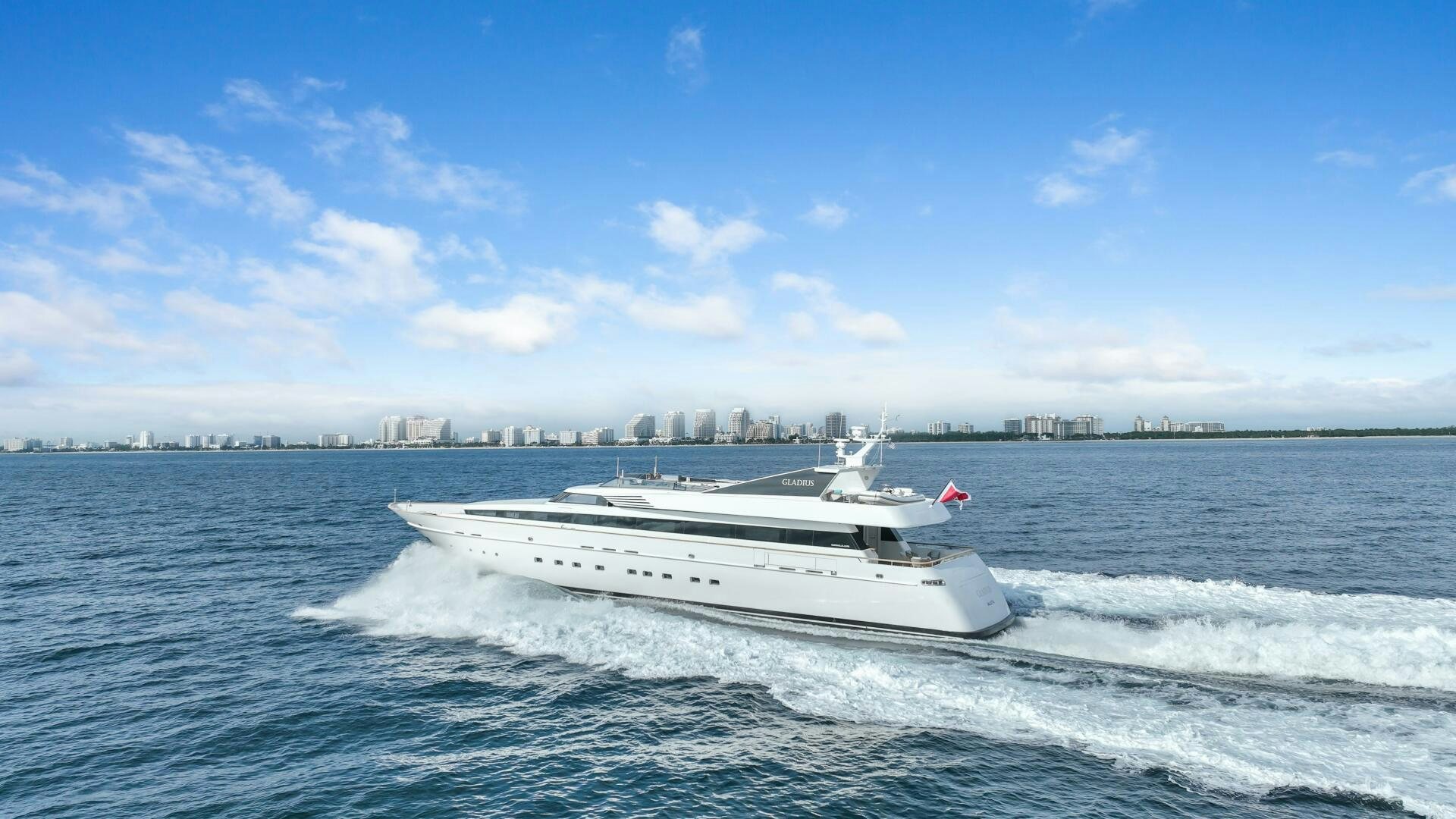 a white boat on the water aboard GLADIUS Yacht for Sale