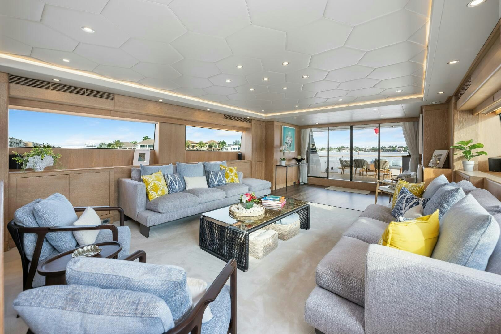 a living room with a large window aboard GLADIUS Yacht for Sale