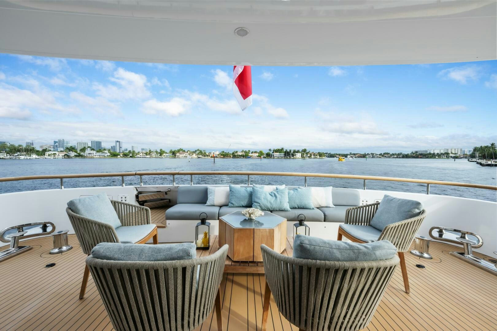 a patio with chairs and tables aboard GLADIUS Yacht for Sale