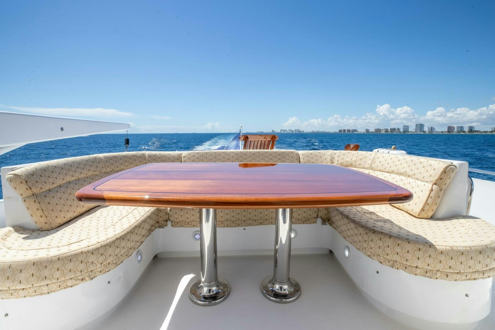 a table on a balcony aboard PIRATE RADIO Yacht for Sale