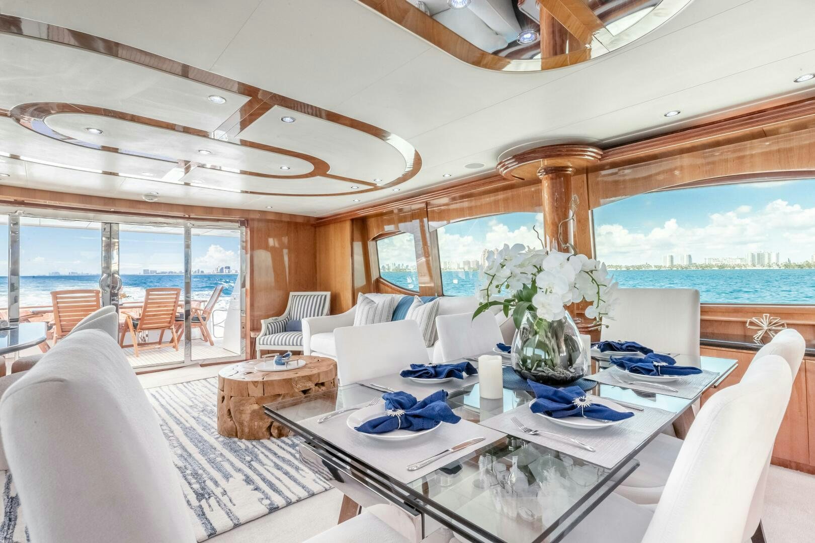 a room with a table and chairs aboard PIRATE RADIO Yacht for Sale