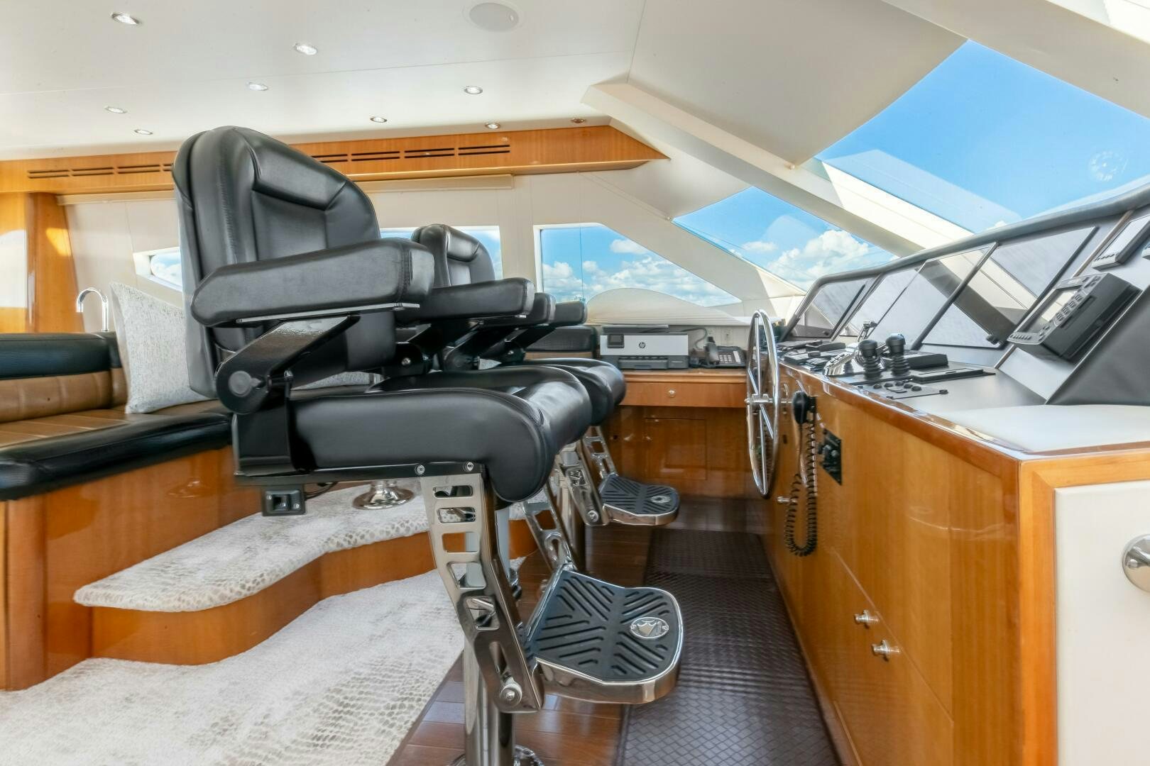 a black chair in a room aboard PIRATE RADIO Yacht for Sale