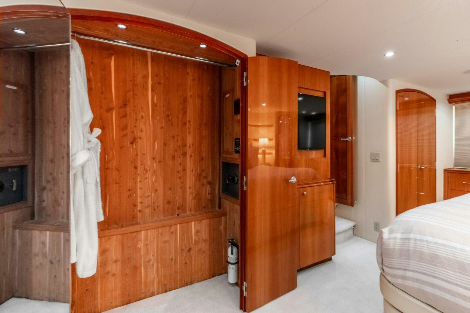 a room with wooden cabinets aboard PIRATE RADIO Yacht for Sale