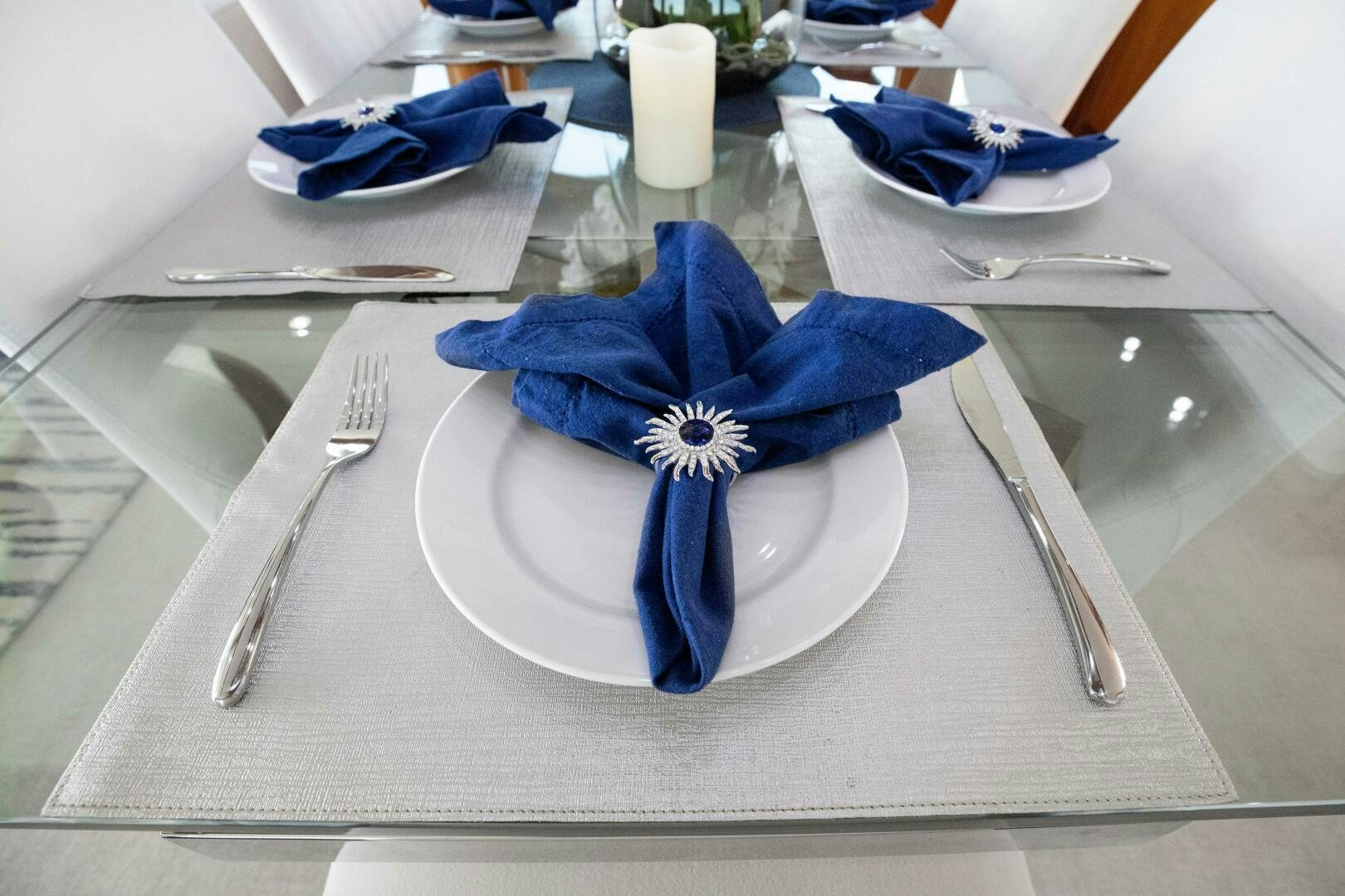 a plate with a blue flower on it aboard PIRATE RADIO Yacht for Sale