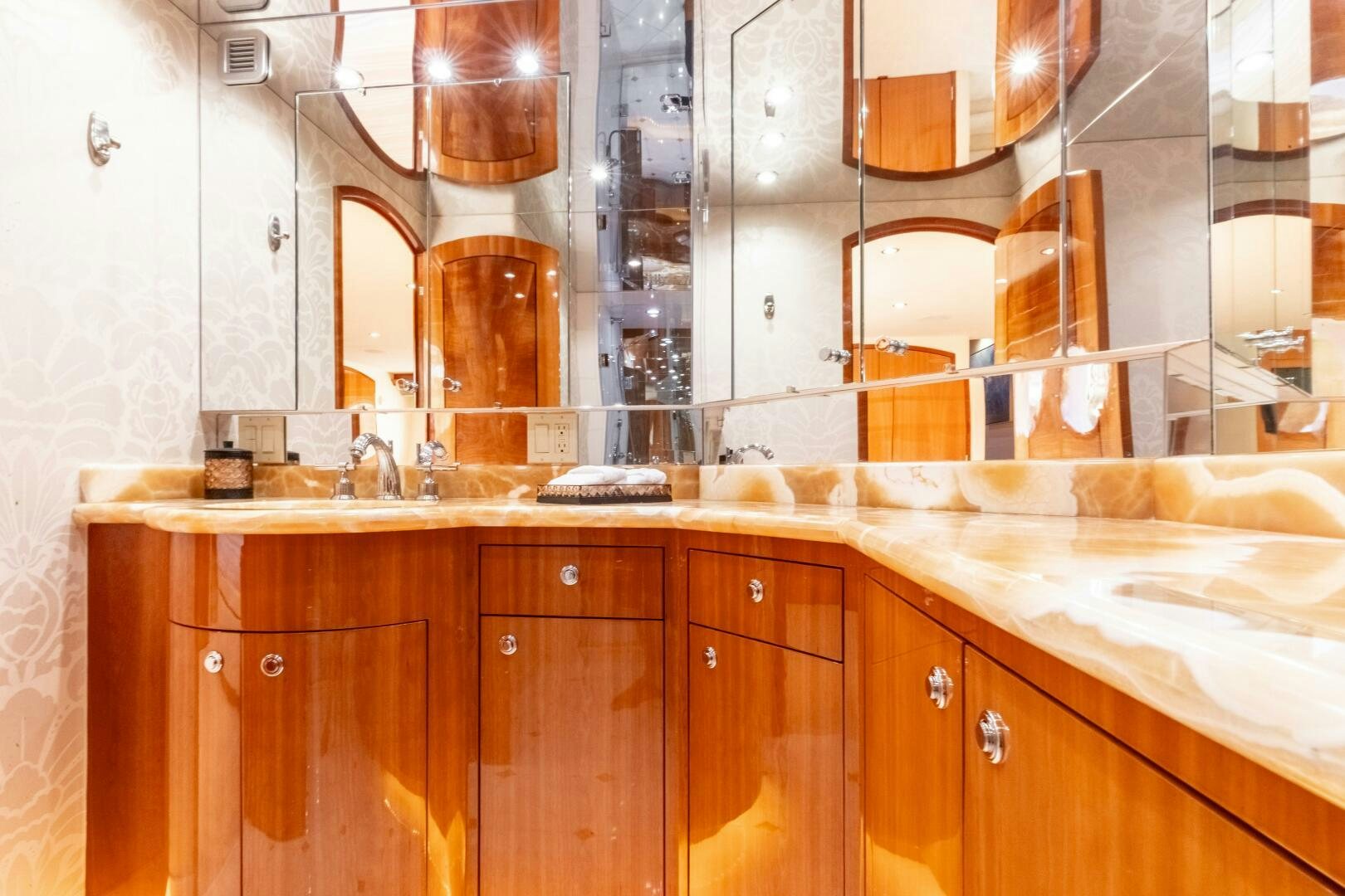 a bathroom with a large mirror aboard PIRATE RADIO Yacht for Sale