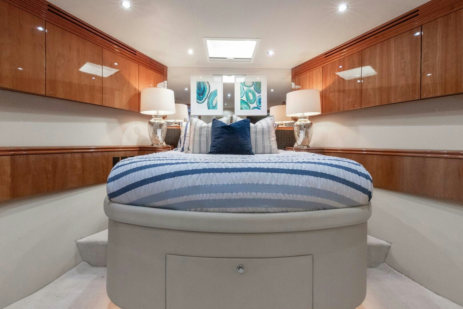a large bedroom with a large bed aboard PIRATE RADIO Yacht for Sale