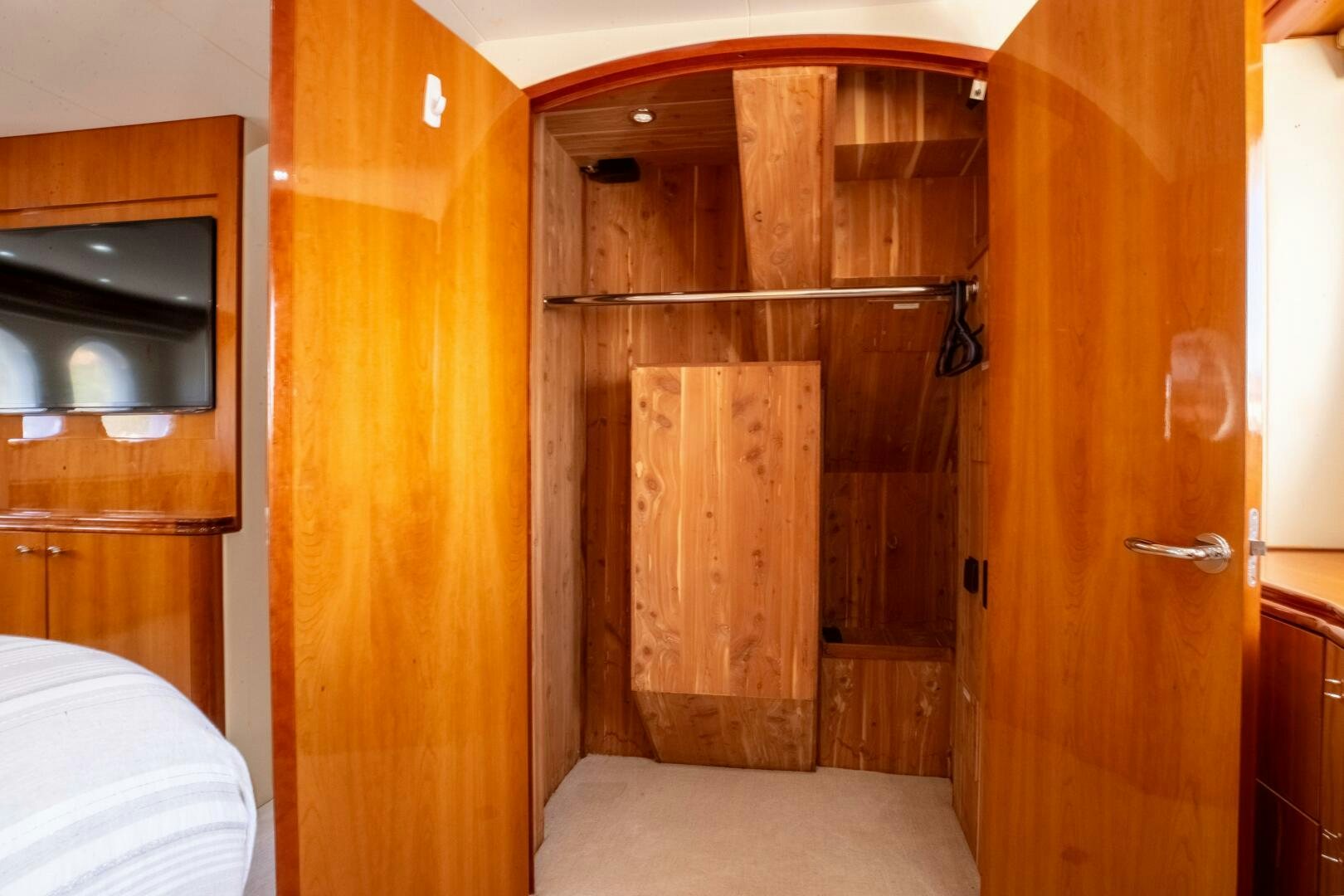 a wooden cabinet in a room aboard PIRATE RADIO Yacht for Sale