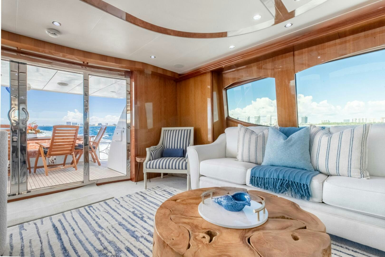 a living room with a large window aboard PIRATE RADIO Yacht for Sale