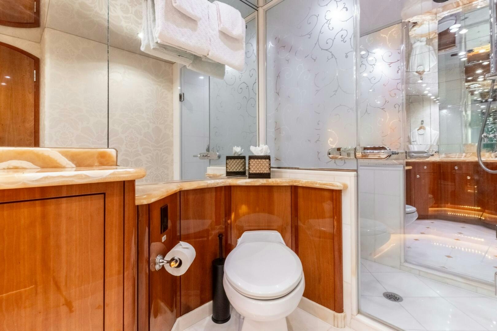 a bathroom with a toilet and a sink aboard PIRATE RADIO Yacht for Sale