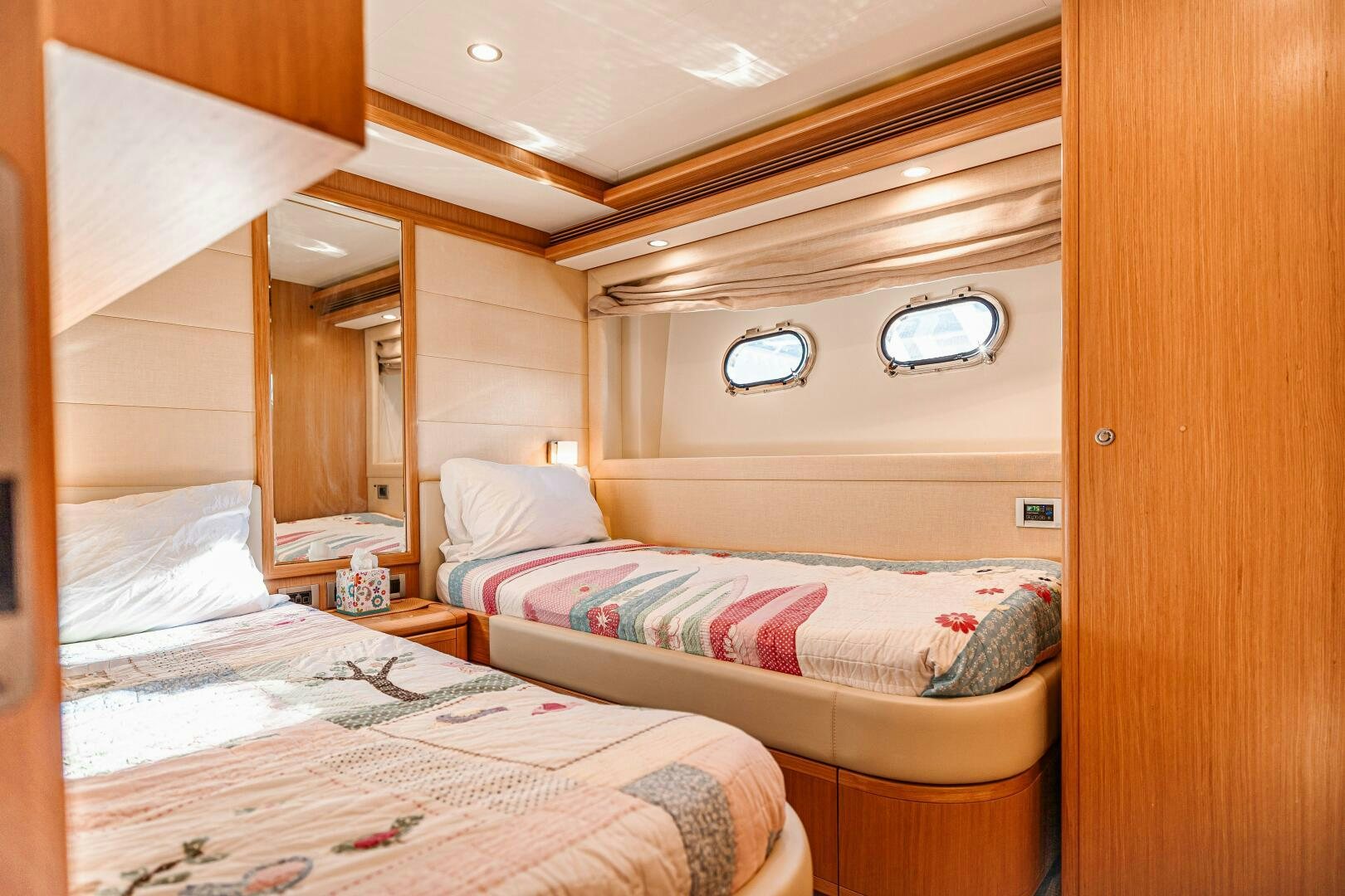 a couple of beds in a room aboard CRYSTAL PARROT Yacht for Sale