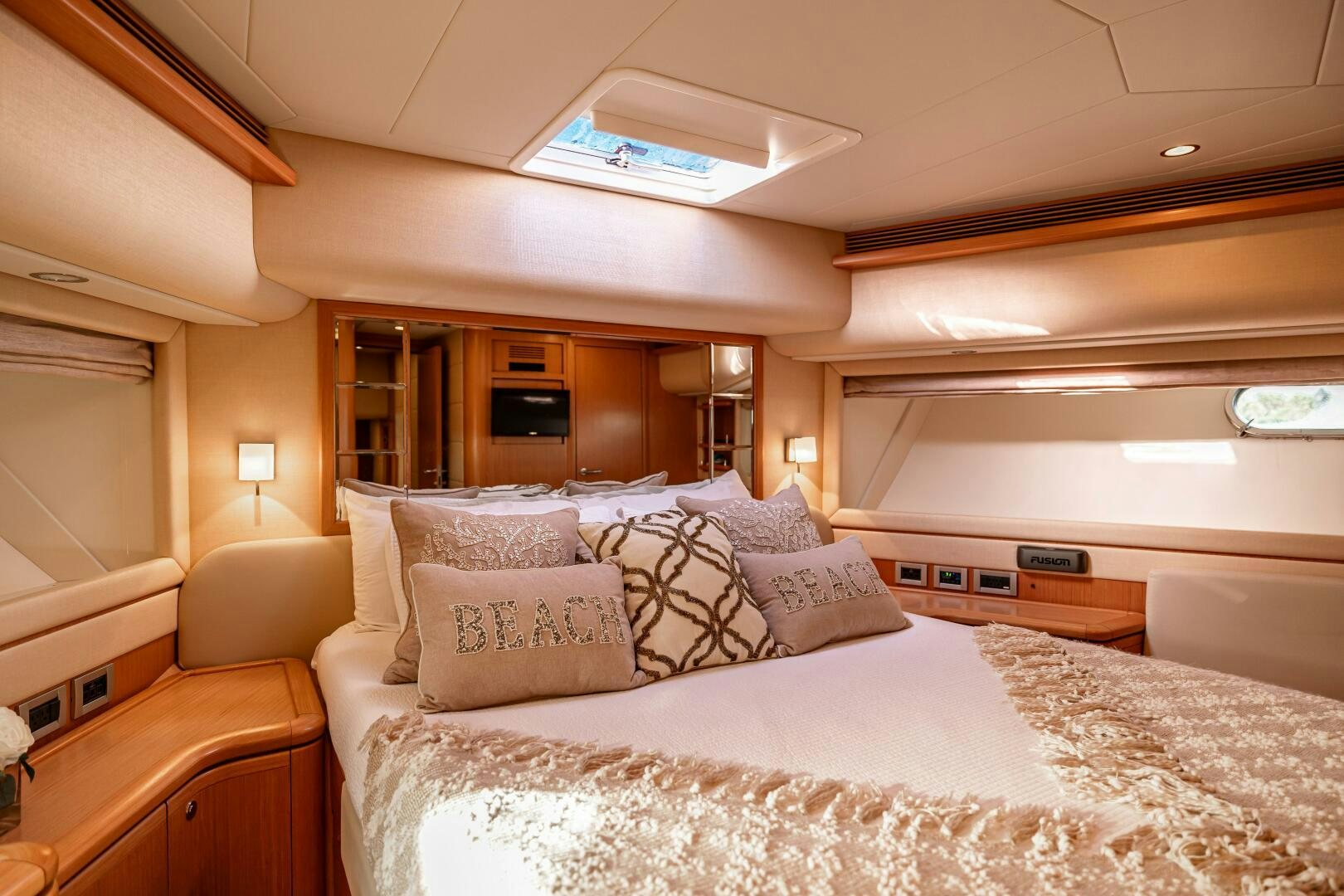a bed with pillows aboard CRYSTAL PARROT Yacht for Sale