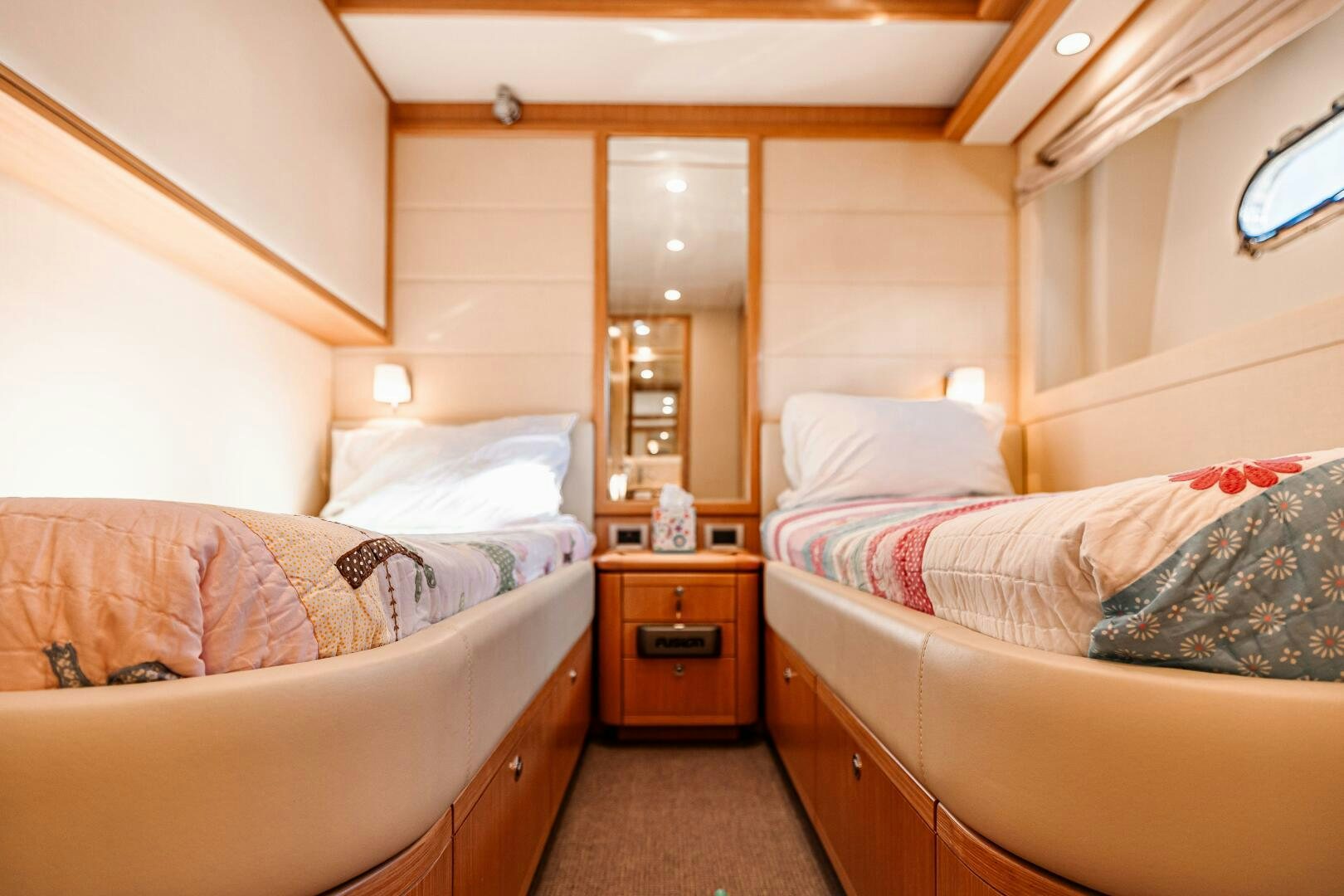 a room with two beds aboard CRYSTAL PARROT Yacht for Sale