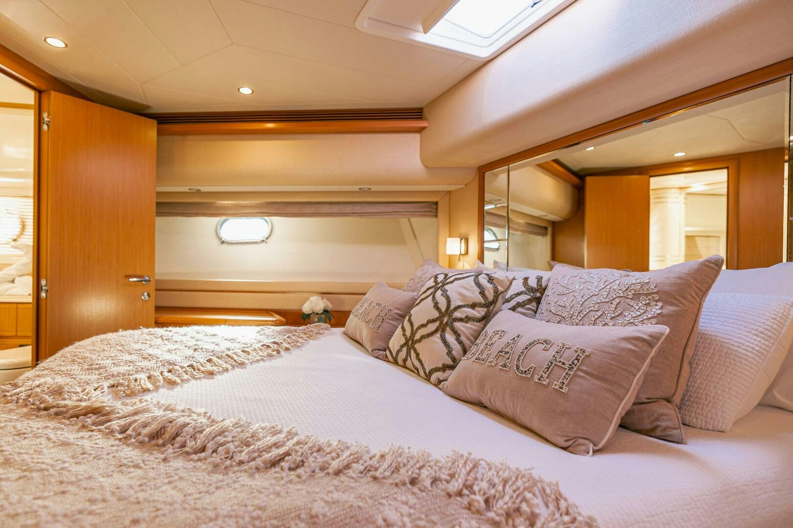 a bed with pillows aboard CRYSTAL PARROT Yacht for Sale